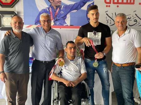 النائب مازن غنايم في زيارة للبطل الأولمبي إياد شلبي: